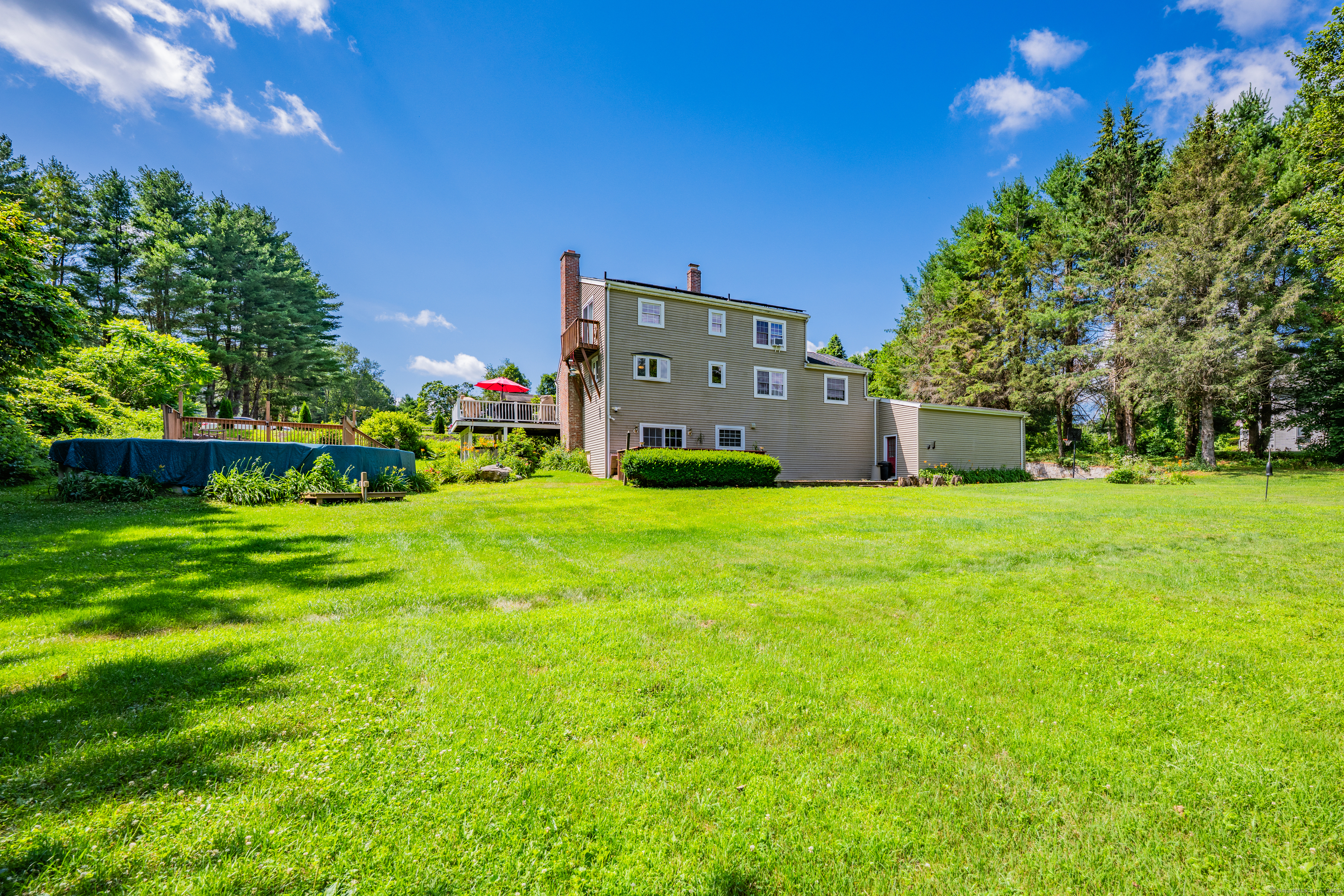 21 Long Meadow Road Bethlehem, CT 06751 - Photo 9 of 32 a view of a house with a big yard