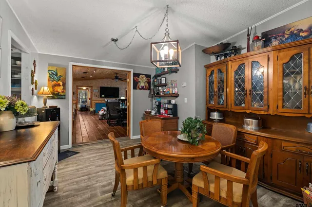 a very nice looking room with a ceiling fan