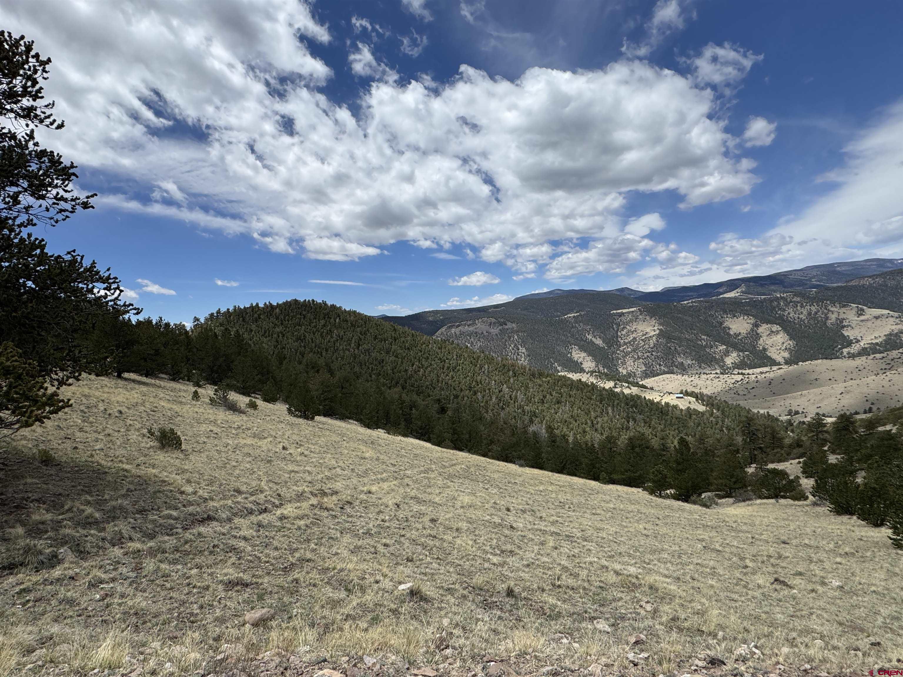 Tbd Tbd Tbd La Del Norte, CO 81132 - Photo 7 of 10 a view of a dry yard with mountains in the background