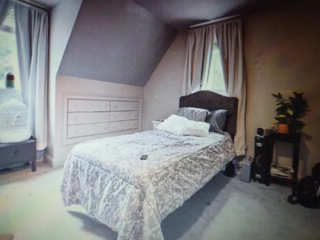 a bathroom with a sink toilet and mirror