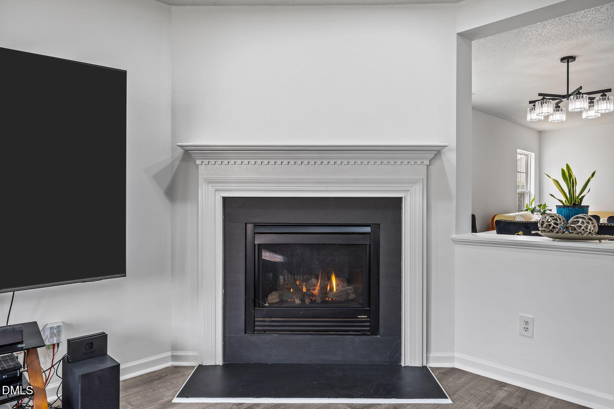 6307 Quitman Trail Raleigh, NC 27610 - Photo 14 of 35 a living room with furniture and a fireplace