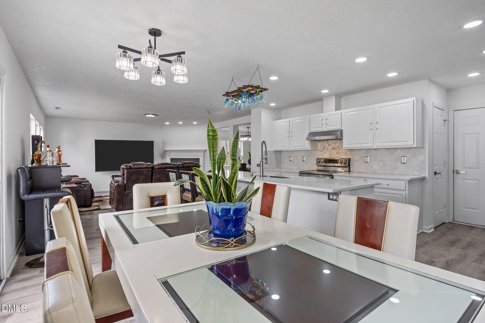 6307 Quitman Trail Raleigh, NC 27610 - Photo 20 of 35 a view of kitchen with cabinets and wooden floor