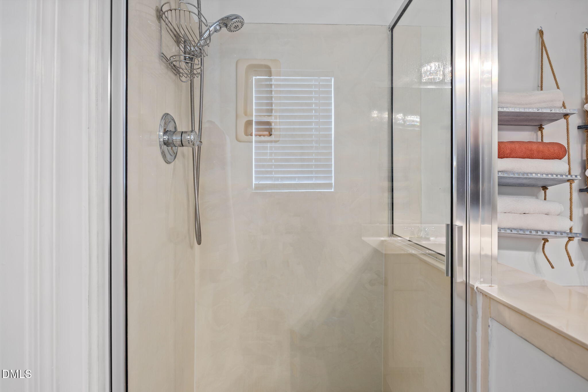6307 Quitman Trail Raleigh, NC 27610 - Photo 26 of 35 a bathroom with a shower and a sink