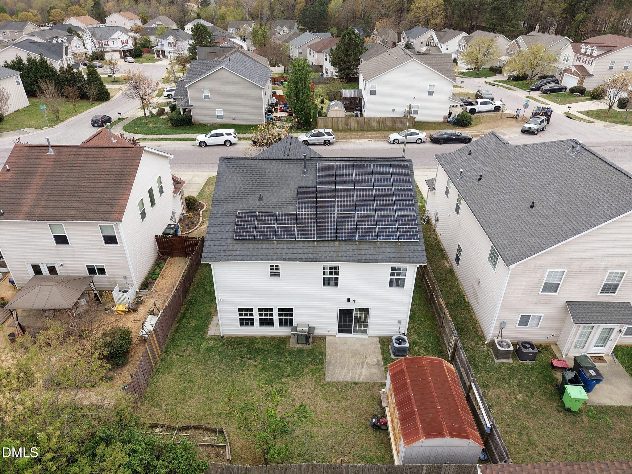 6307 Quitman Trail Raleigh, NC 27610 - Photo 33 of 35 an aerial view of a house with swimming pool and large trees
