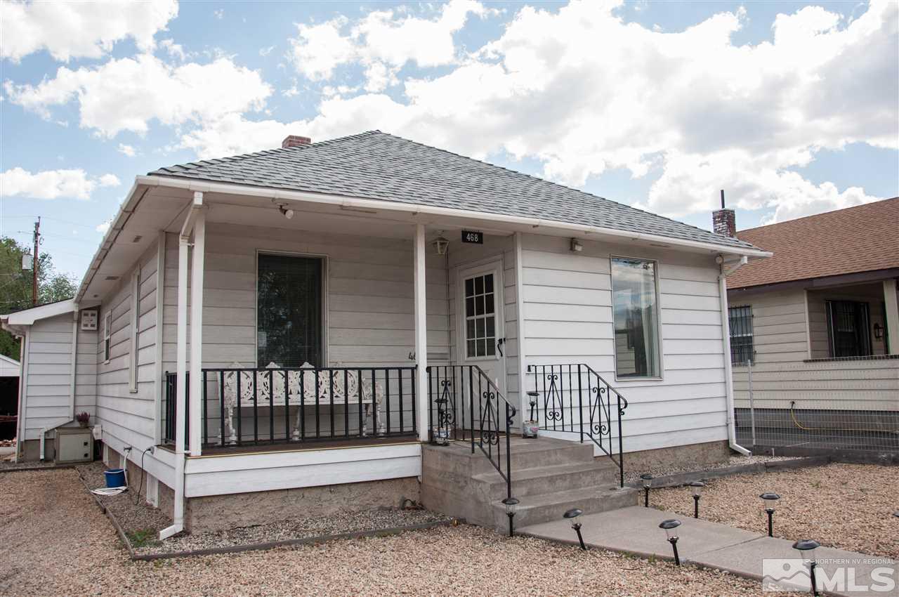 468 East 8th Street Reno, NV 89512 - Photo 1 of 1 a view of a house with a small yard and wooden fence