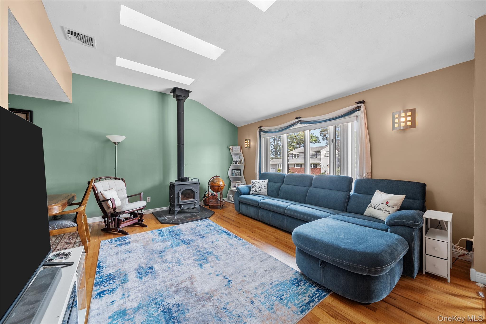 34 West 21st Street Deer Park, NY 11729 - Photo 4 of 33 a living room with furniture and a window
