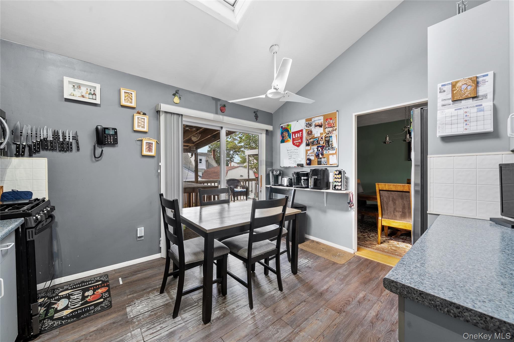 34 West 21st Street Deer Park, NY 11729 - Photo 10 of 33 a dining room with furniture and wooden floor