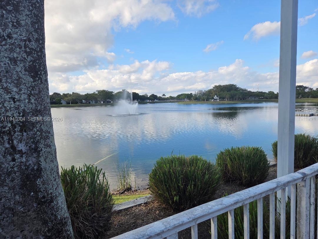 13741 Southwest 149th Cir Lane, Unit 242 Miami, FL 33186 - Photo 8 of 25 a view of a lake from a yard