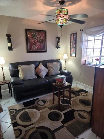 a view of outdoor space with playground and green space