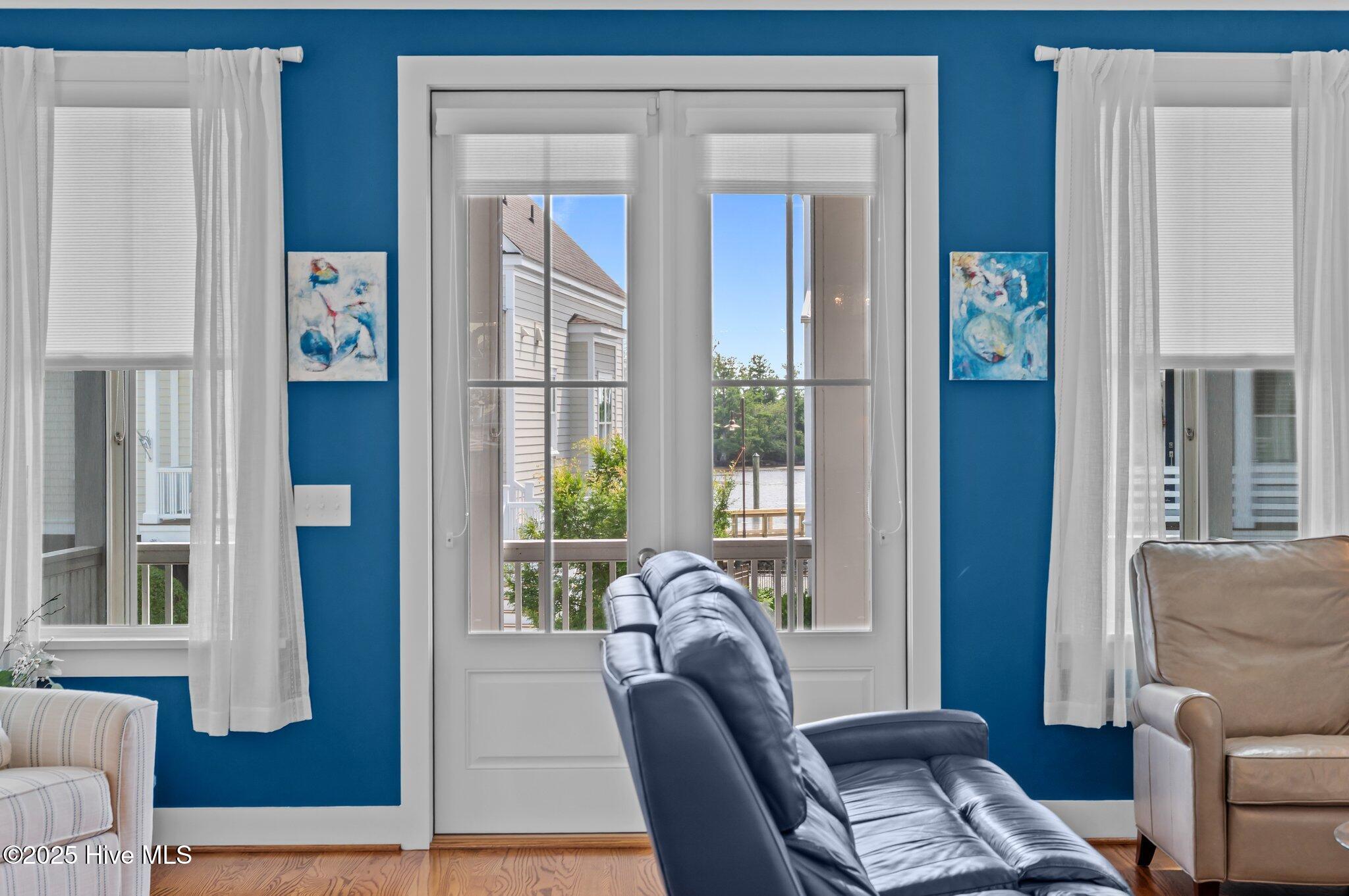 233 East Water Street Washington, NC 27889 - Photo 28 of 47 French doors to the water view screened porch