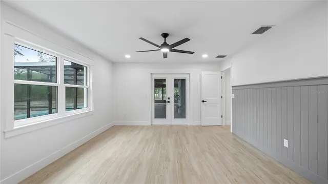 a view of a swimming pool with a patio