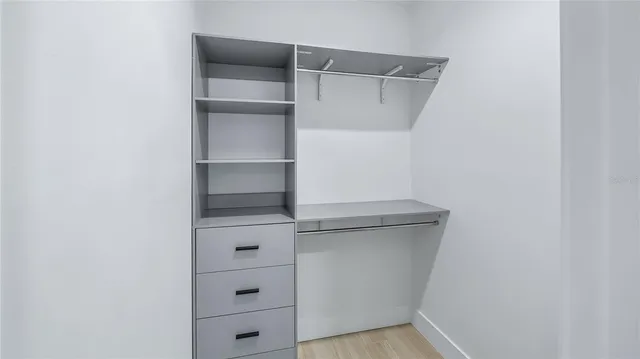 a view of a field with an ocean