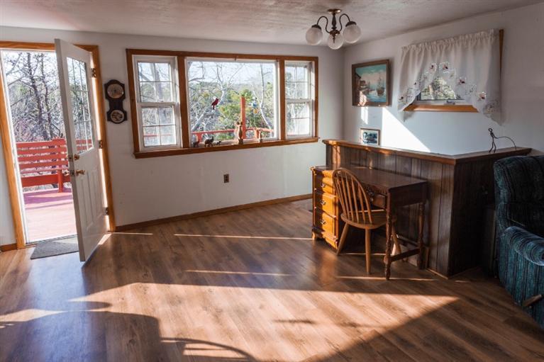 11 Josephs Road Truro, MA 02666 - Photo 12 of 19 a view of a livingroom with furniture window and wooden floor