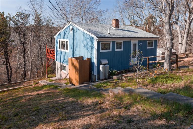 11 Josephs Road Truro, MA 02666 - Photo 4 of 19 a front view of a house with garden