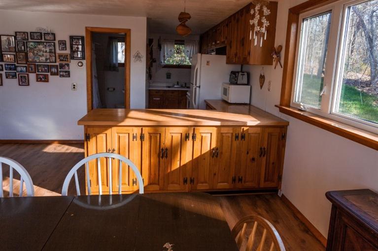 11 Josephs Road Truro, MA 02666 - Photo 8 of 19 a bed sitting in a bedroom next to a window