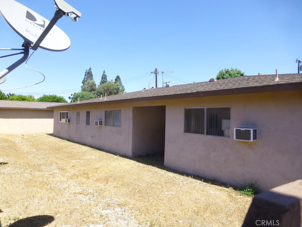 2115 Broden Street Anaheim, CA 92802 - Photo 15 of 23 a front view of a house with a yard