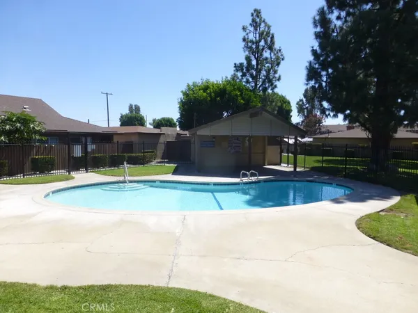 a view of a house with swimming pool