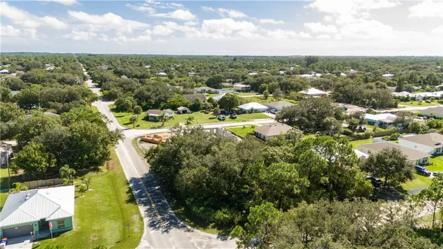 a view of a city with mountains in the background