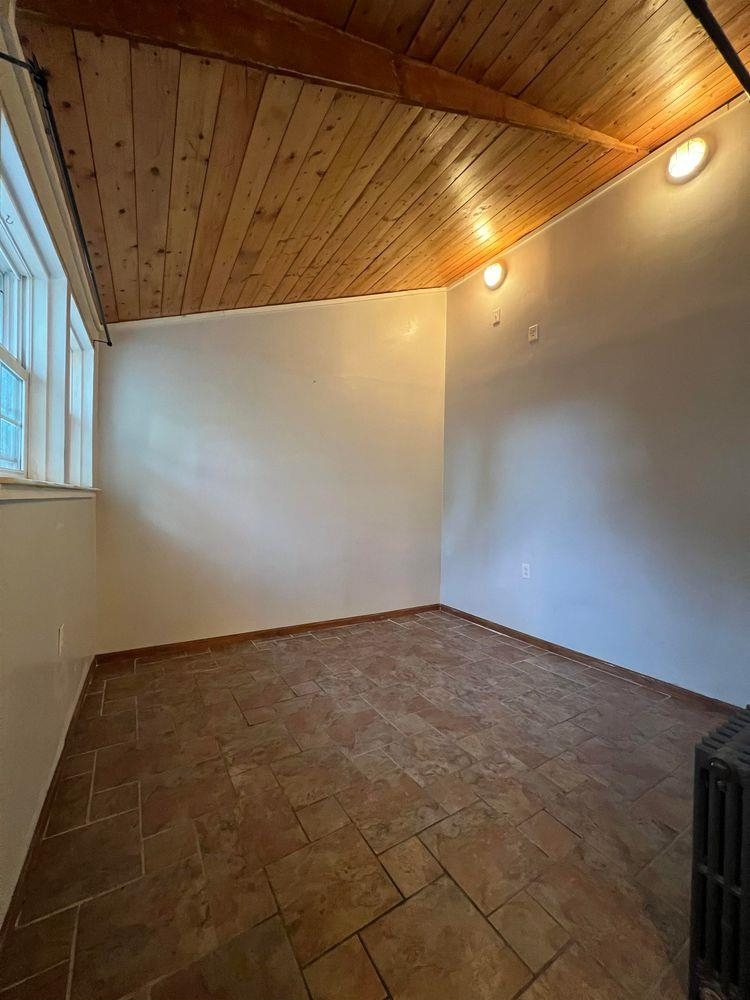 334 Paterson Plank Road, Unit 1 Jersey City, NJ 07307 - Photo 5 of 20 a view of an empty room