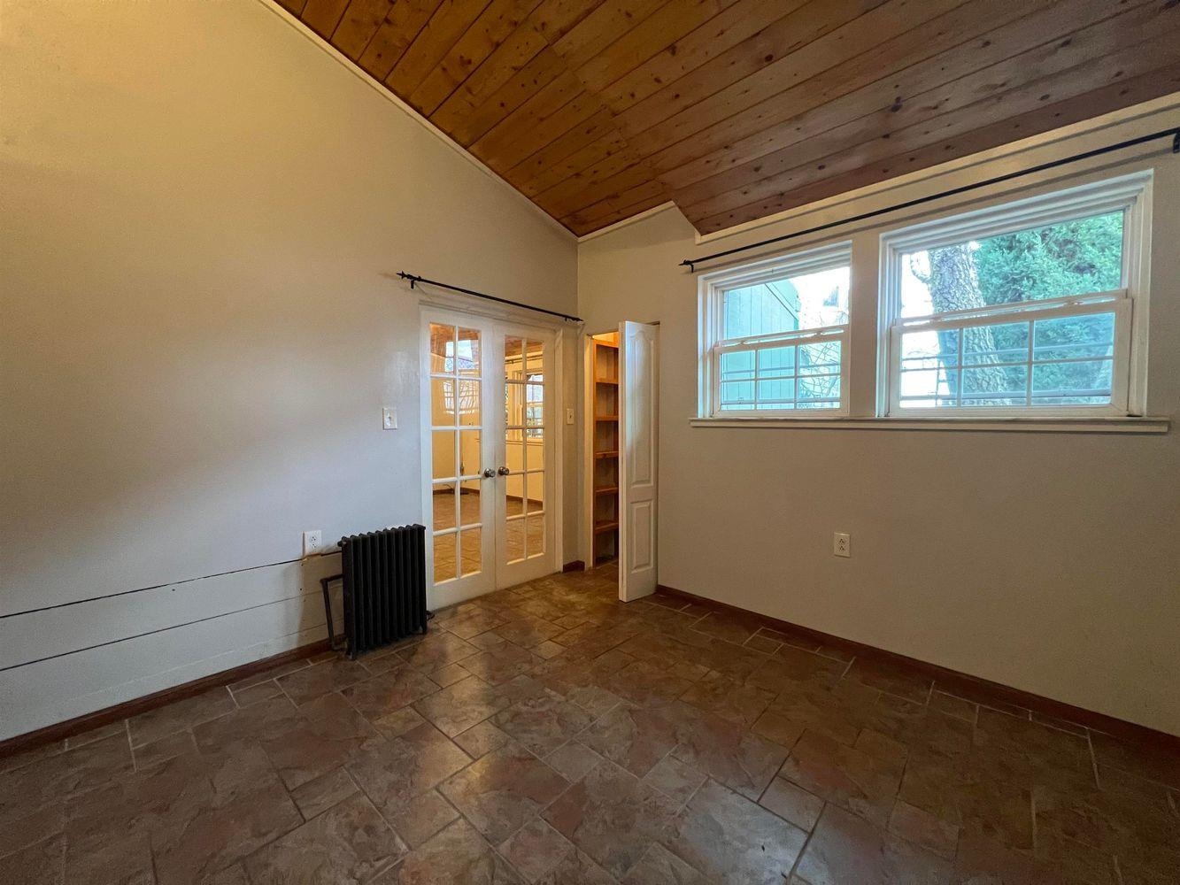 334 Paterson Plank Road, Unit 1 Jersey City, NJ 07307 - Photo 7 of 20 a view of an empty room with a window