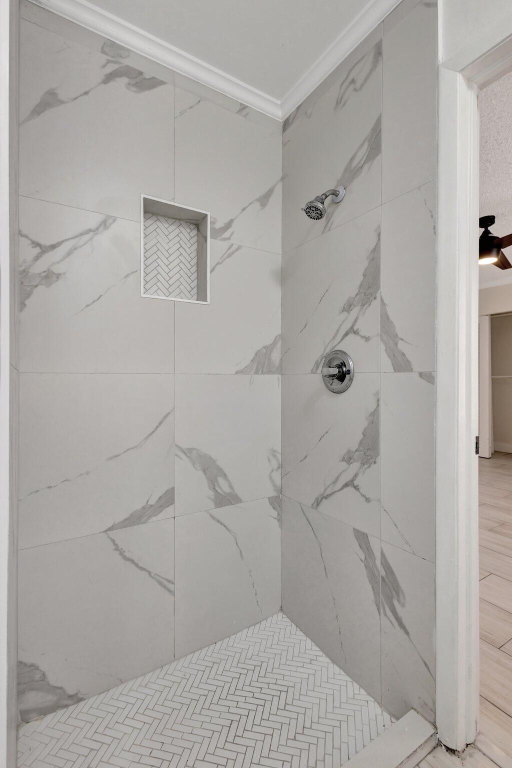 1225 16th Avenue North Lake Worth Beach, FL 33460 - Photo 8 of 18 a bathroom with a sink and shower