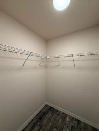 a view of a room with racks on the wall