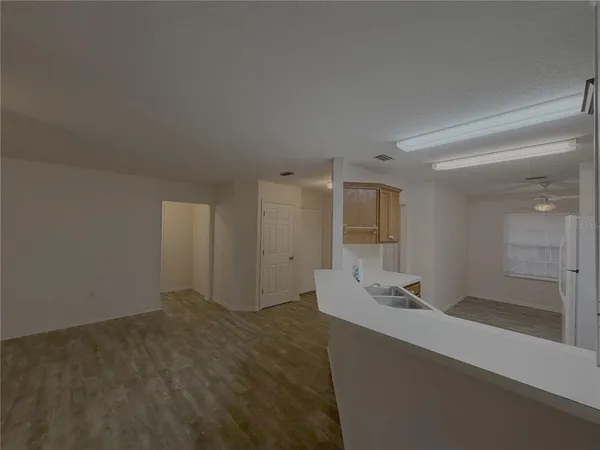 a bathroom with a sink and mirror