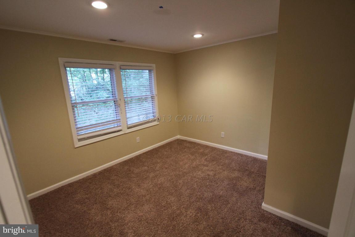 68 Sandyhook Road Ocean Pines, MD 21811 - Photo 14 of 35 an empty room with windows