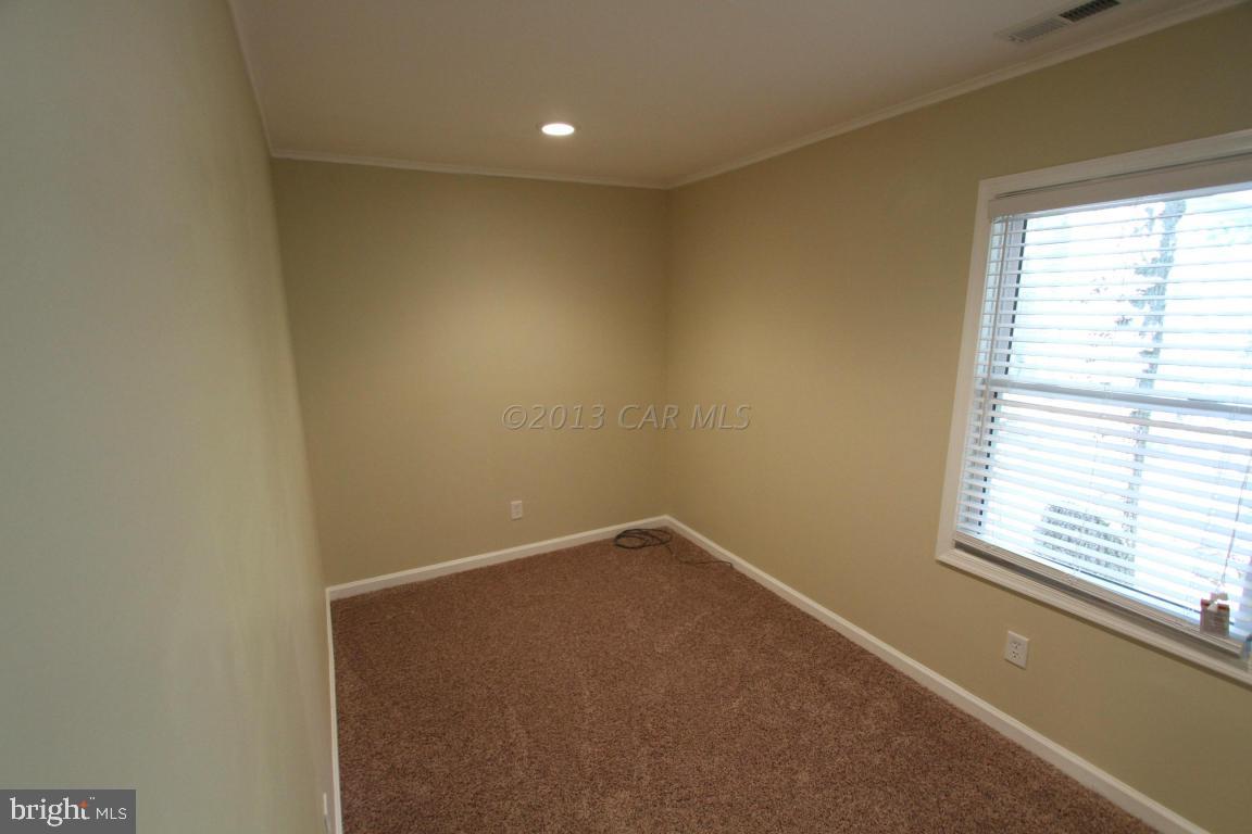 68 Sandyhook Road Ocean Pines, MD 21811 - Photo 15 of 35 an empty room with a window