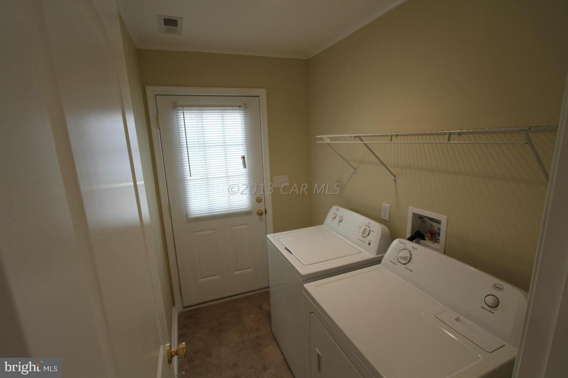 68 Sandyhook Road Ocean Pines, MD 21811 - Photo 19 of 35 a utility room with dryer and washer