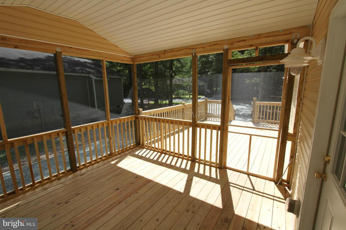 68 Sandyhook Road Ocean Pines, MD 21811 - Photo 24 of 35 a view of balcony with wooden floor