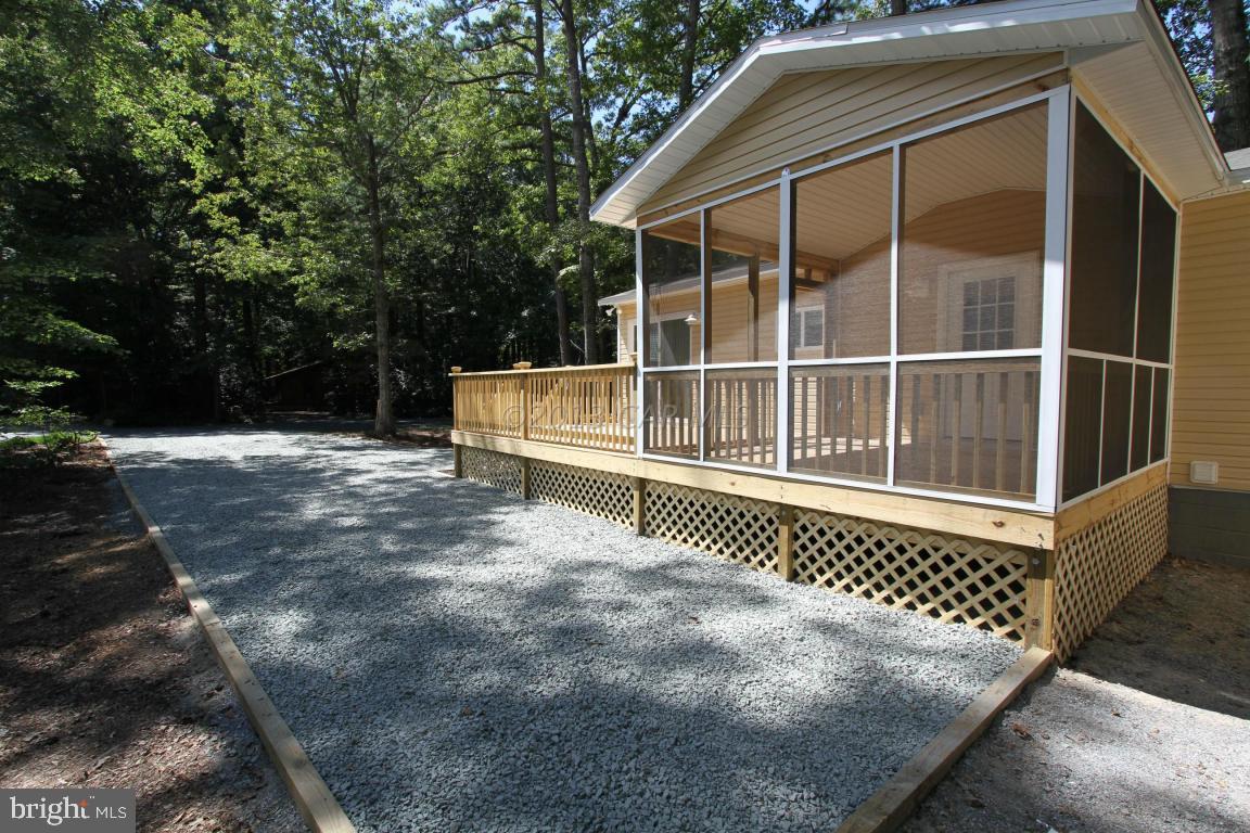 68 Sandyhook Road Ocean Pines, MD 21811 - Photo 31 of 35 a view of outdoor space with seating area