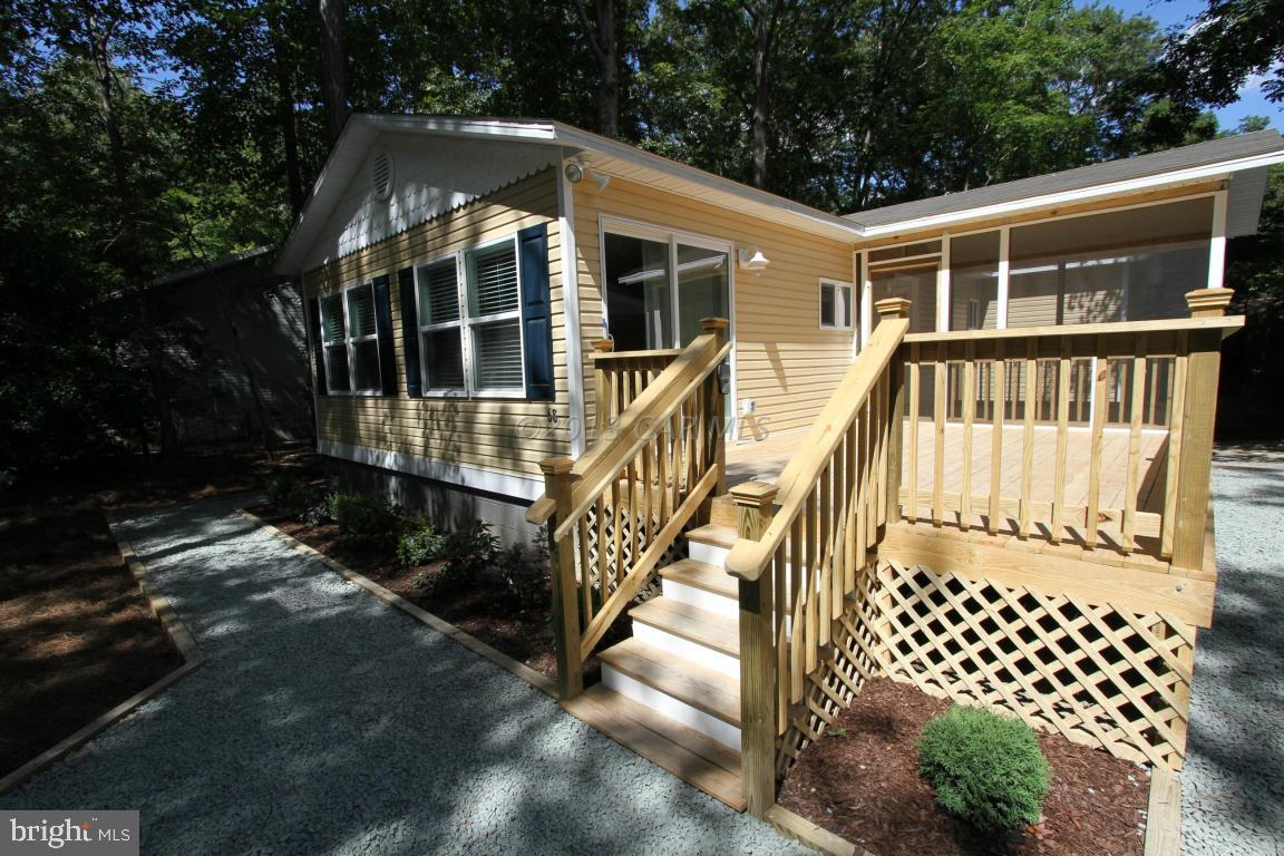 68 Sandyhook Road Ocean Pines, MD 21811 - Photo 33 of 35 a front view of a house with a yard