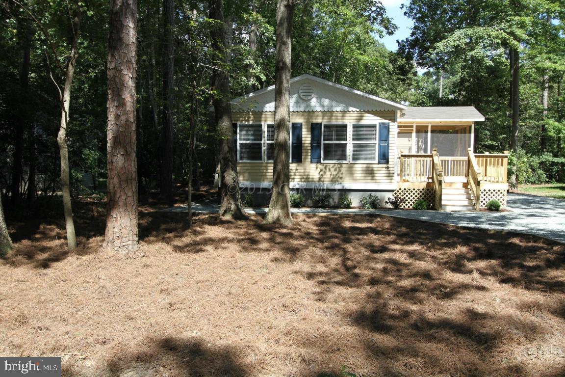 68 Sandyhook Road Ocean Pines, MD 21811 - Photo 35 of 35 a front view of a house with a yard