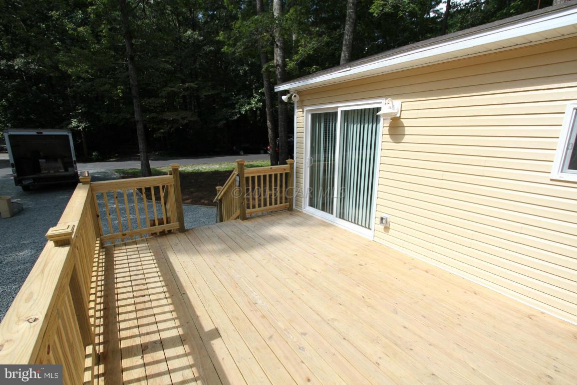 68 Sandyhook Road Ocean Pines, MD 21811 - Photo 7 of 35 a view of balcony with deck