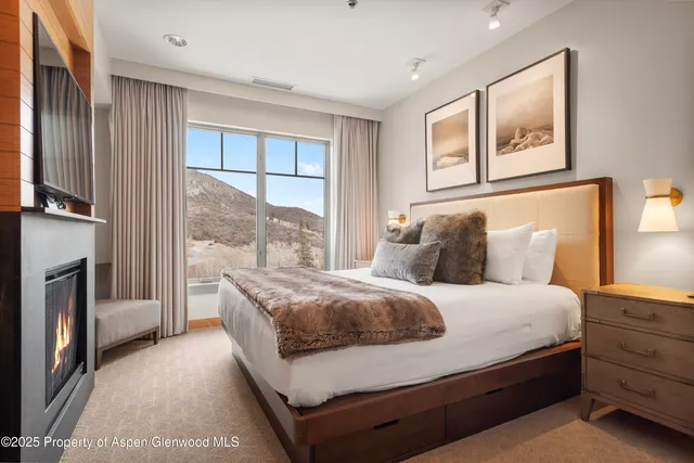 a bathroom with a shower and a sink