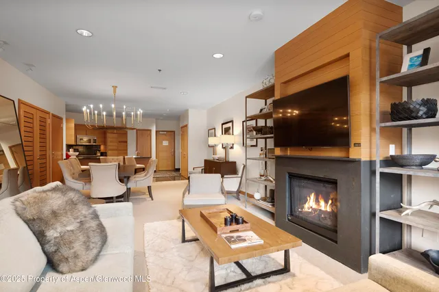 a kitchen with lots of counter top space and dining table