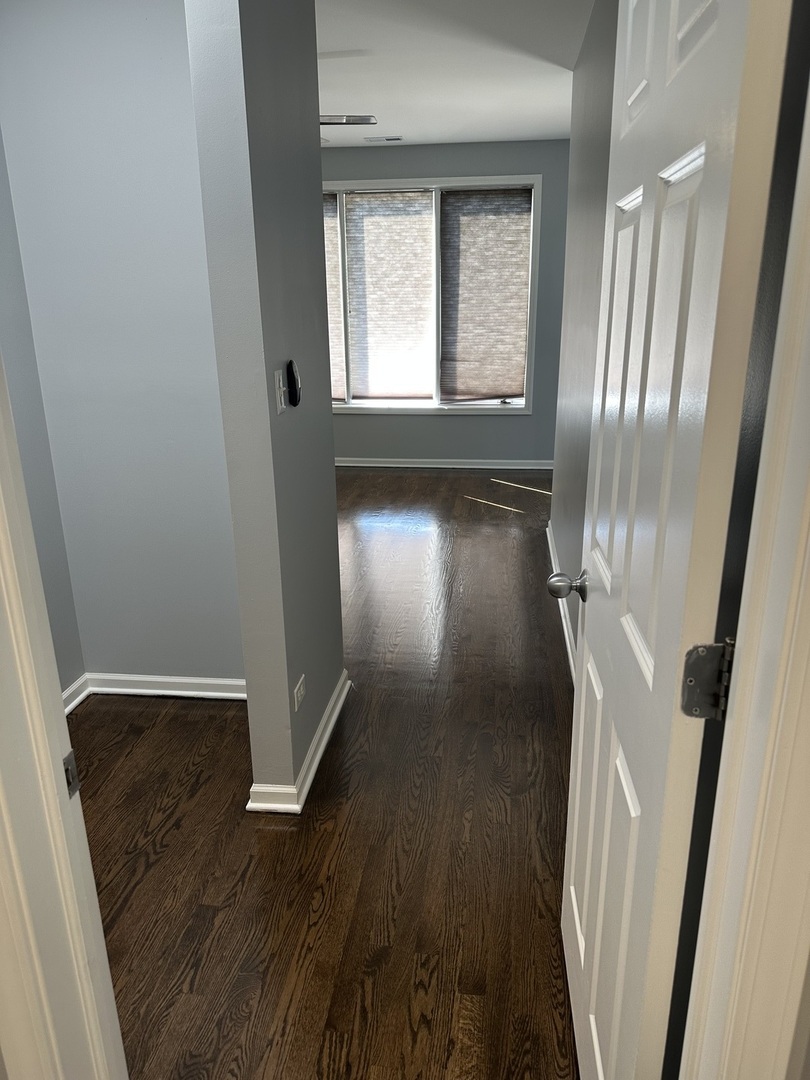 5219 South Michigan Avenue, Unit 2W Chicago, IL 60615 - Photo 10 of 14 a view of entryway with wooden floor