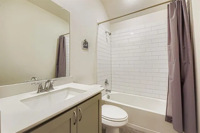 a room with furniture and a window