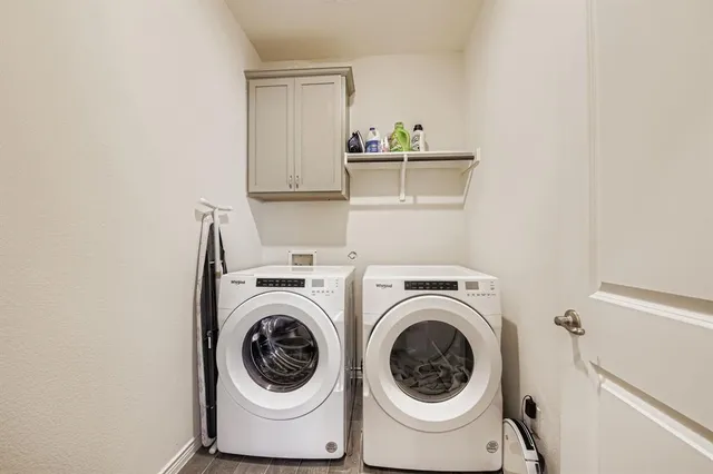 a view of a swimming pool with a lounge chair