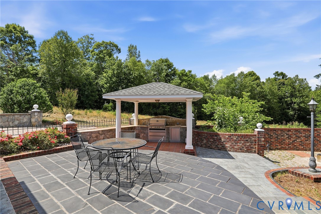 13300 West Patrick Henry Road Doswell, VA 23047 - Photo 48 of 69 Expansive outdoor patio featuring large format sto