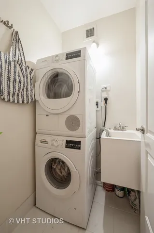 a utility room with dryer and washer