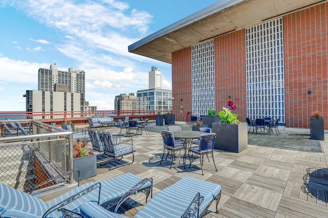 a view of a terrace with furniture