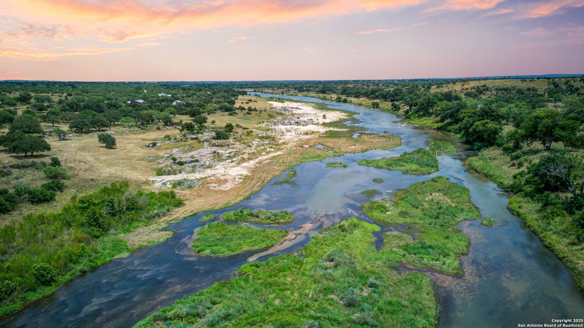 8661 Lower Willow Creek Road Mason, TX 76856 - Photo 3 of 5 a view of a lake with houses