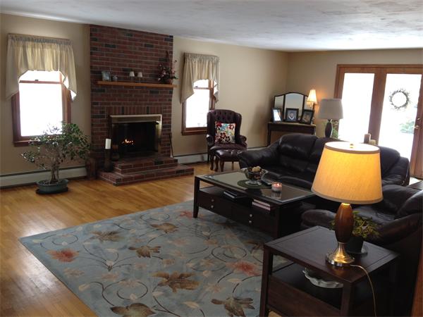 7 Lord Lane Rutland, MA 01543 - Photo 5 of 28 a living room with furniture rug and a fireplace