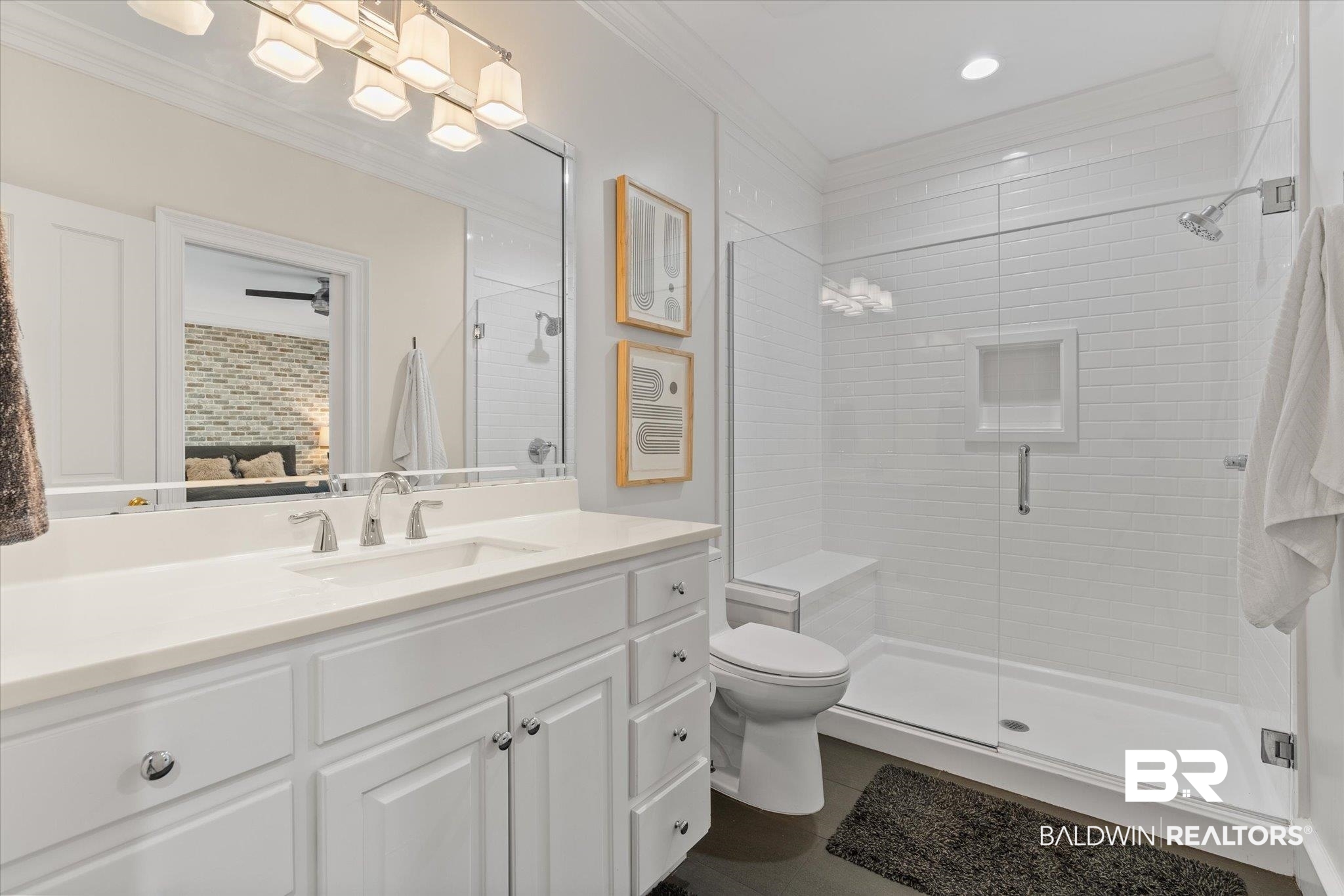 8561 Dawes Lake Road Mobile, AL 36619 - Photo 24 of 63 Full bath featuring a stall shower, vanity, tile patterned floors, and ornamental molding