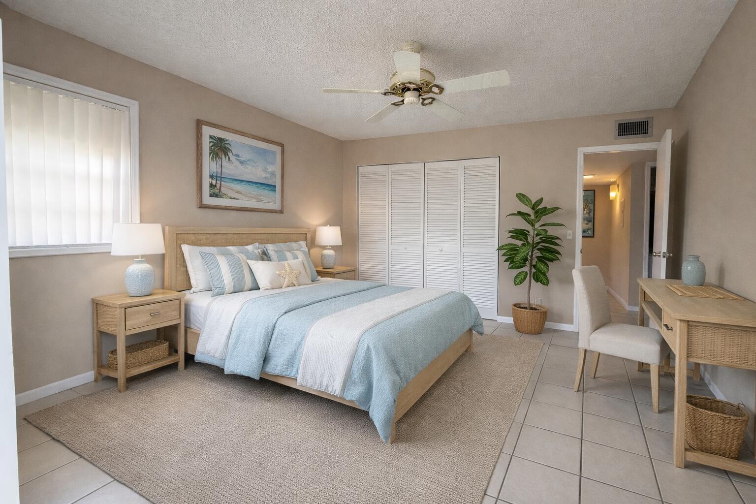 894 Flanders South Delray Beach, FL 33484 - Photo 17 of 21 a bedroom with a bed and a table