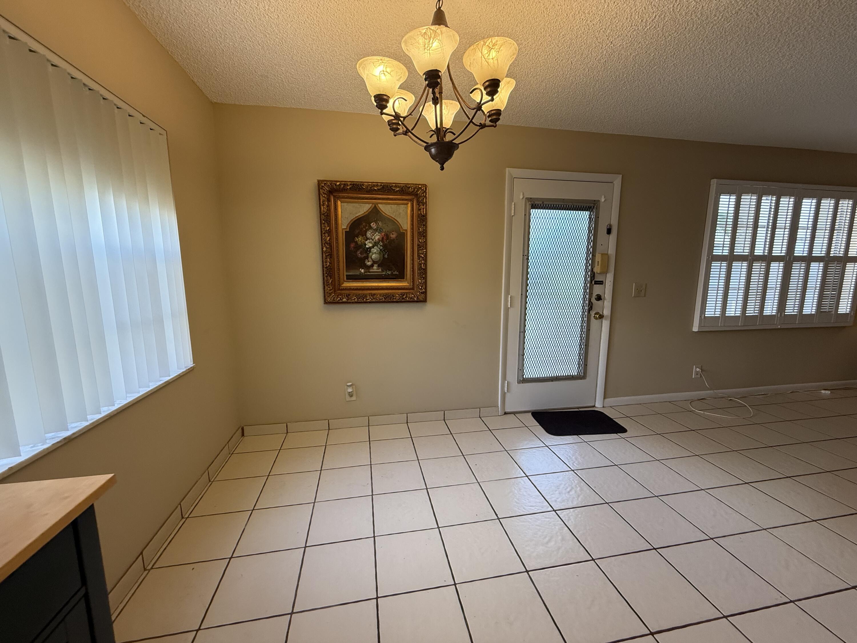 894 Flanders South Delray Beach, FL 33484 - Photo 4 of 16 a view of an entryway