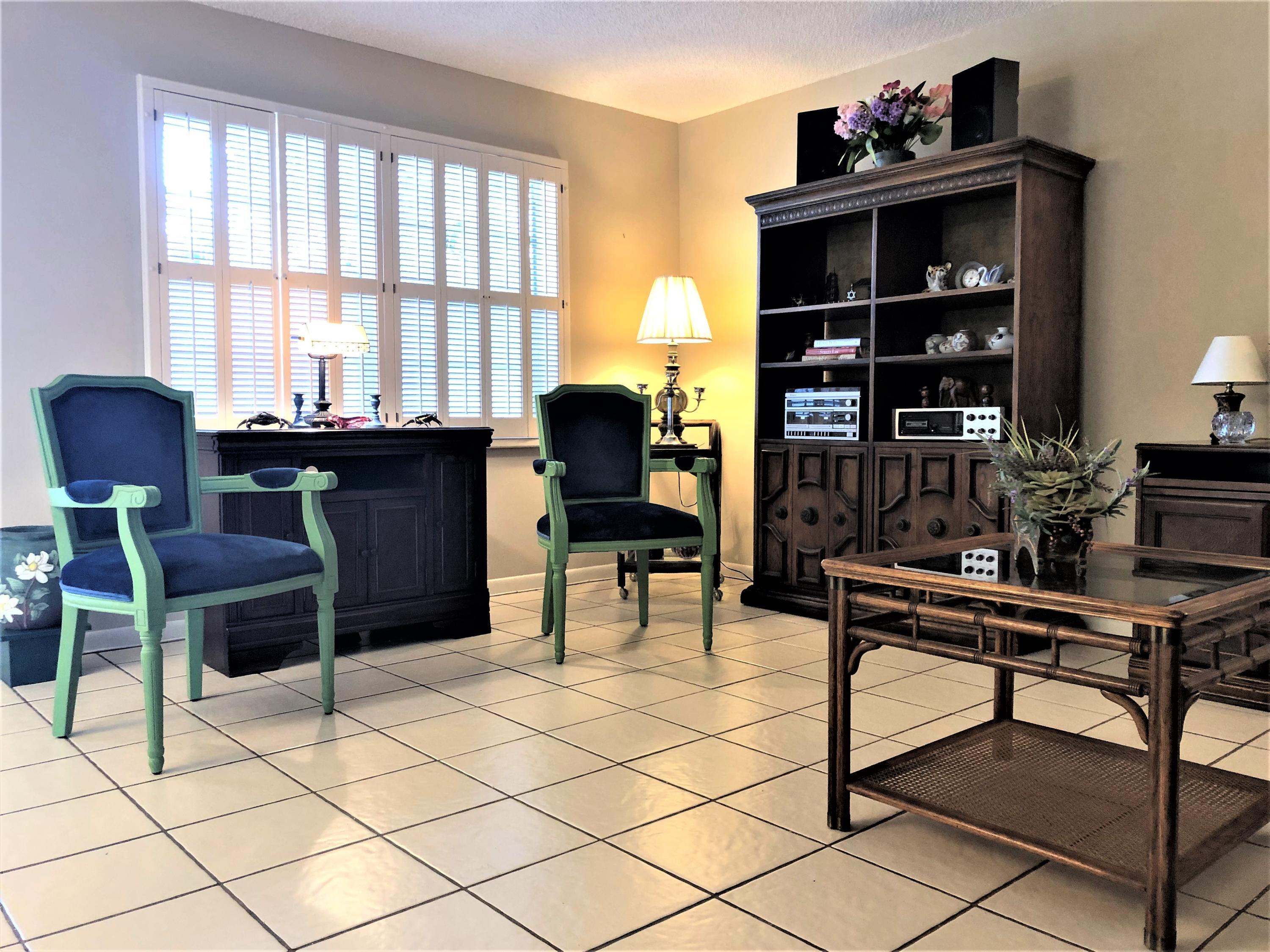 894 Flanders South Delray Beach, FL 33484 - Photo 5 of 21 a view of a workspace with furniture and a window