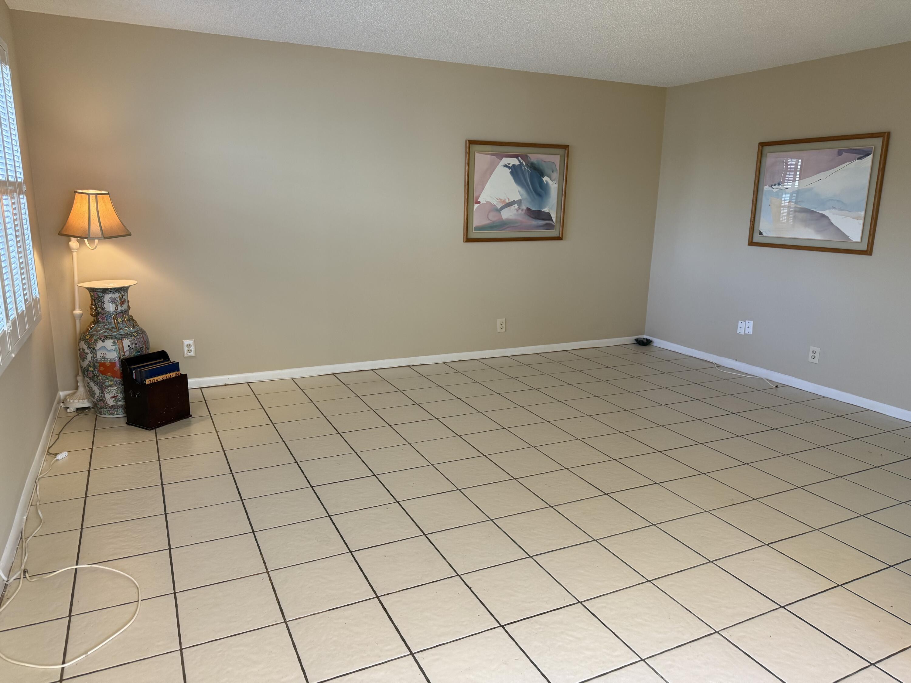 894 Flanders South Delray Beach, FL 33484 - Photo 8 of 21 a view of a livingroom with wooden floor